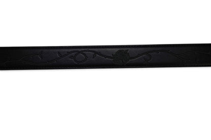 VASANA black premium leather belt featuring a delicate engraved rose vine pattern along the strap.